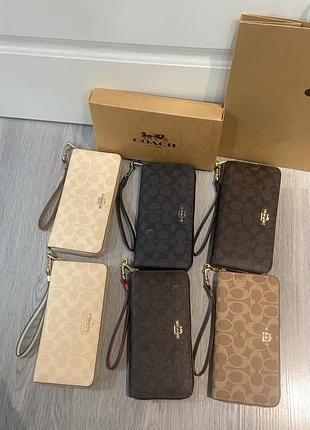 Гаманці бренду coach