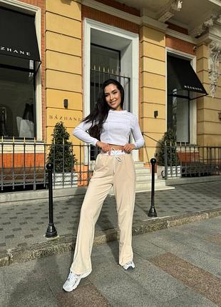 Стильный женский костюм топ и штаны свободного кроя
