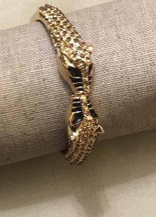 Красивий браслет з кристалами на пружині