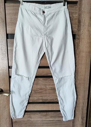 Рваные тонкие брюки bershka