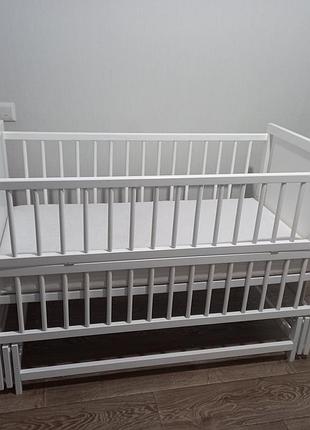Дитяча кроватка