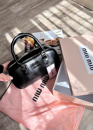 Сумки бочки miu miu