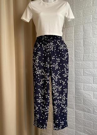 Сині в квітковий принт штани від lcw