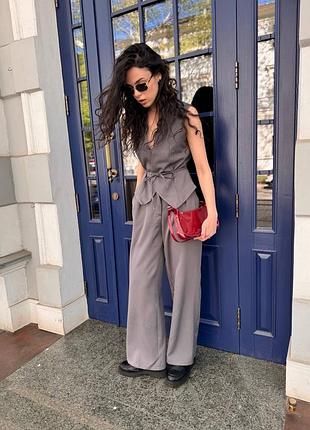 Стильний костюм жилет з поясом та брюки палаццо3 фото