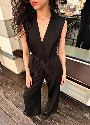 Стильний костюм жилет з поясом та брюки палаццо5 фото