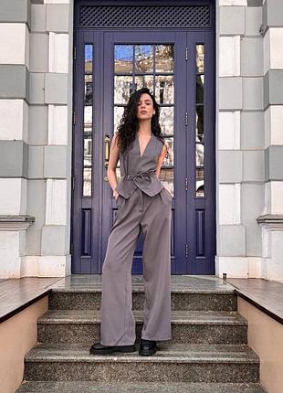 Стильний костюм жилет з поясом та брюки палаццо7 фото