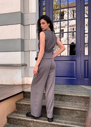 Стильний костюм жилет з поясом та брюки палаццо4 фото