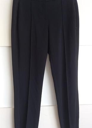 Новые молодежные брюки снизу и карманы на замотках