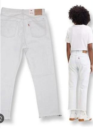Білі джинси levis з необробленим низом