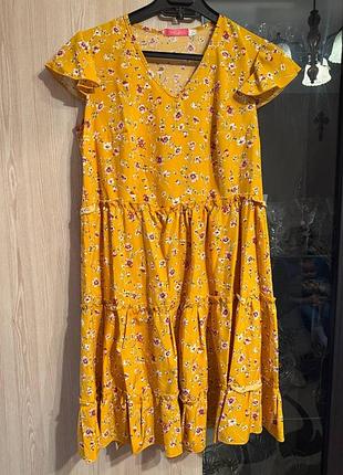 Гірчична жіноча сукня в квітковий принт