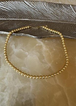 Бусы жемчужные золотистого цвета .