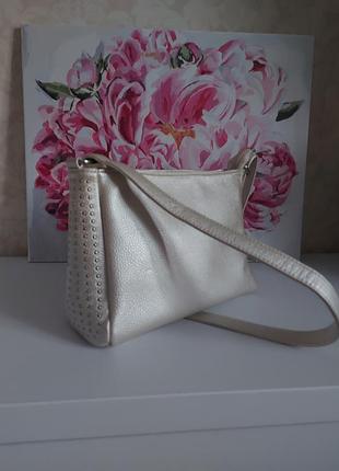 Сумка молочного цвета с блеском