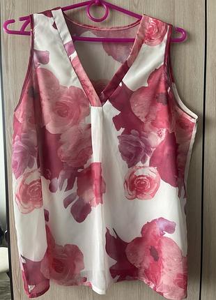 Легенька блузка без рукавів