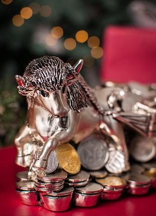 Серебряная статуэтка "тележок с повозом денег"