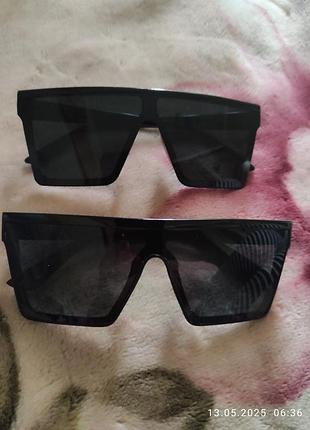 Черные солнцезащитные очки