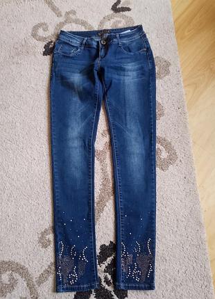 Джинси жіночі