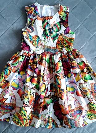 Сукня яскрава в метеликах