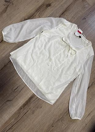 Блузка з бантом