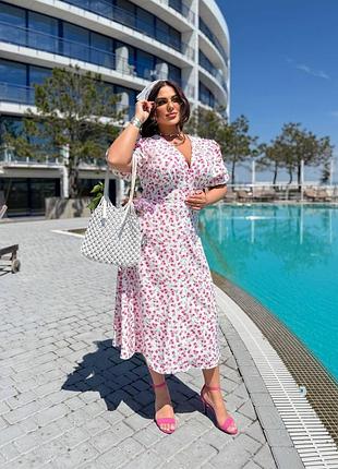 Красива сукня у квітковий принт з коротким рукавом