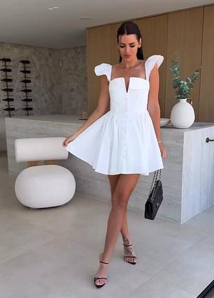 Жіноча ніжна літня сукня міні з ґудзиками