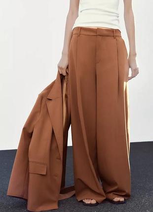 Карамельні брюки із защипами zara new