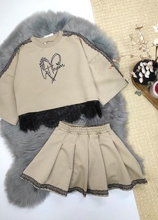 Крутой костюм, топ и юбка