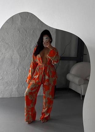 Яскравий оригінальний жіночий костюм оверсайз кардиган і широкі штани принтований комплект