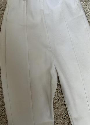 Брюки на худеньку для дівчинки з розрізами спереду 128-134