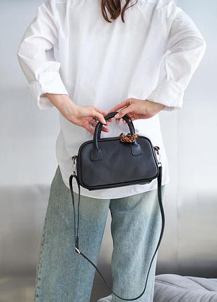 Шкіряна сумочка чорного кольору