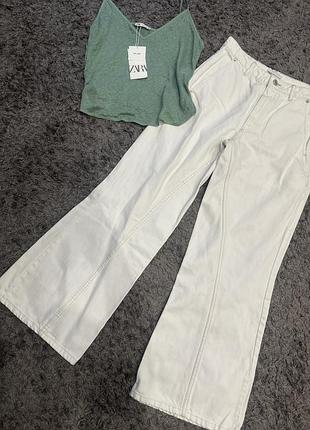 Трендові широкі джинси zara