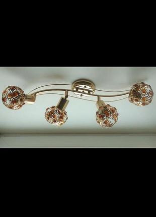 Люстра з поворотними плафонами на 4 лампи