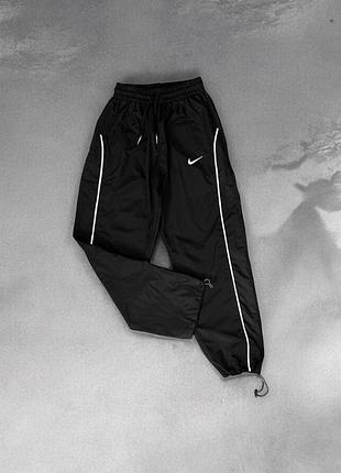 Чоловічі спортивні нейлонові штани nike , оверсайз, плащівка , на утяжках