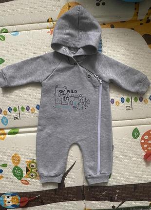 Комбінезон з капюшоном та блискавкою