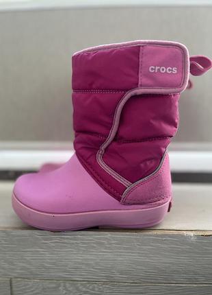 Crocs - снігоходи lodgepoint snow boot k 204660 рожевий