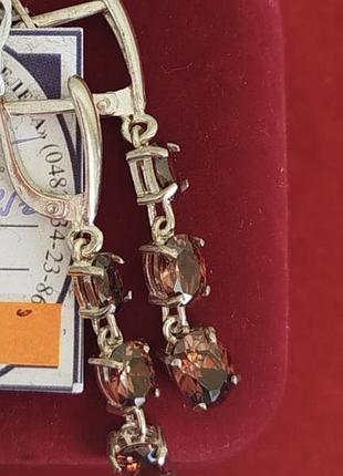 Срібні сережки підвіски з коричневими цирконами.2 фото
