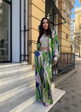 Жіночі літній костюм двійка в піжамному стилі сорочка та штани вільного крою палаццо