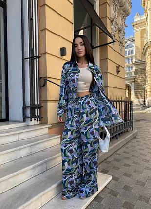 Жіночий літній костюм двійка в піжамному стилі сорочка та штани вільного крою палаццо