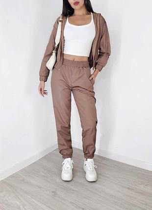 Жіночий костюм з турецької плащівки спортивний коричневий зелений електрик