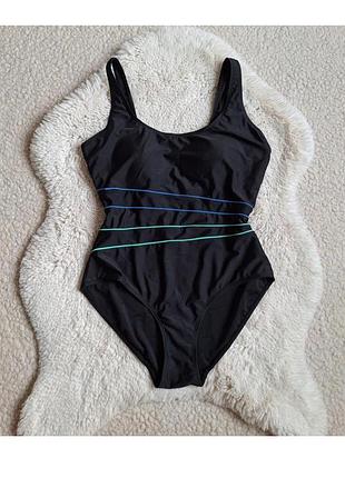 Суцільний спортивний купальник