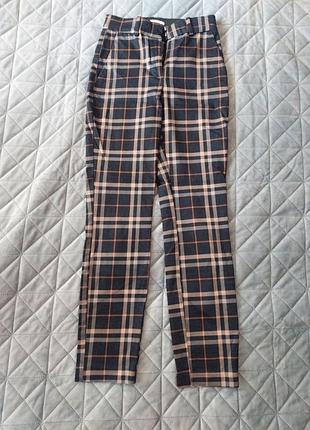 Женские брюки в клетку