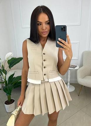 Костюм зі спідницею в стилі miu miu