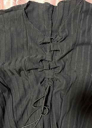 Боді з акцентом на груді. зі шнурівкою