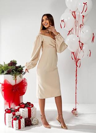 Елегантна сукня міді з довгими обʼємними рукавами приталене плаття з декольте