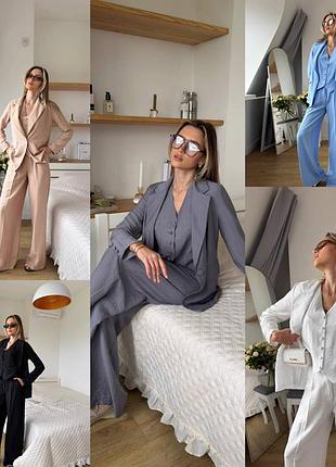 Жіночий костюм трійка: жилетка, піджак і брюки палаццо