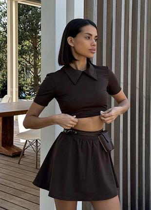 Жіночий шоколадний костюм топ і спідниця з шортами
