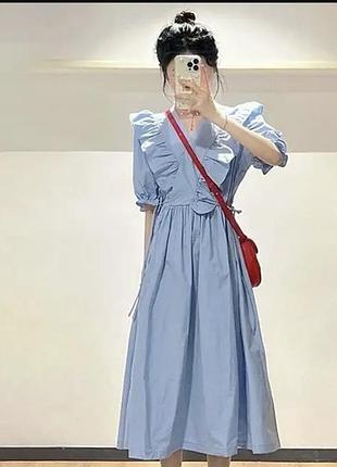 Сукня блакитного кольору