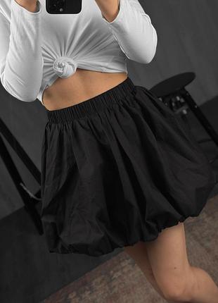 Жіноча чорна юбка