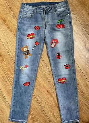 Джинси з наліпками 46/хл