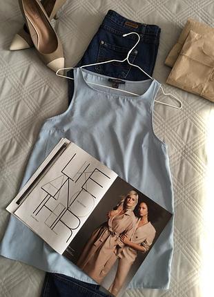 Красивая. луза в небесно-голубом цвете свободного кроя размер 8/36