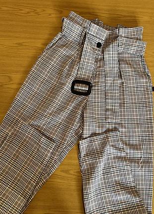 Штани в клітинку